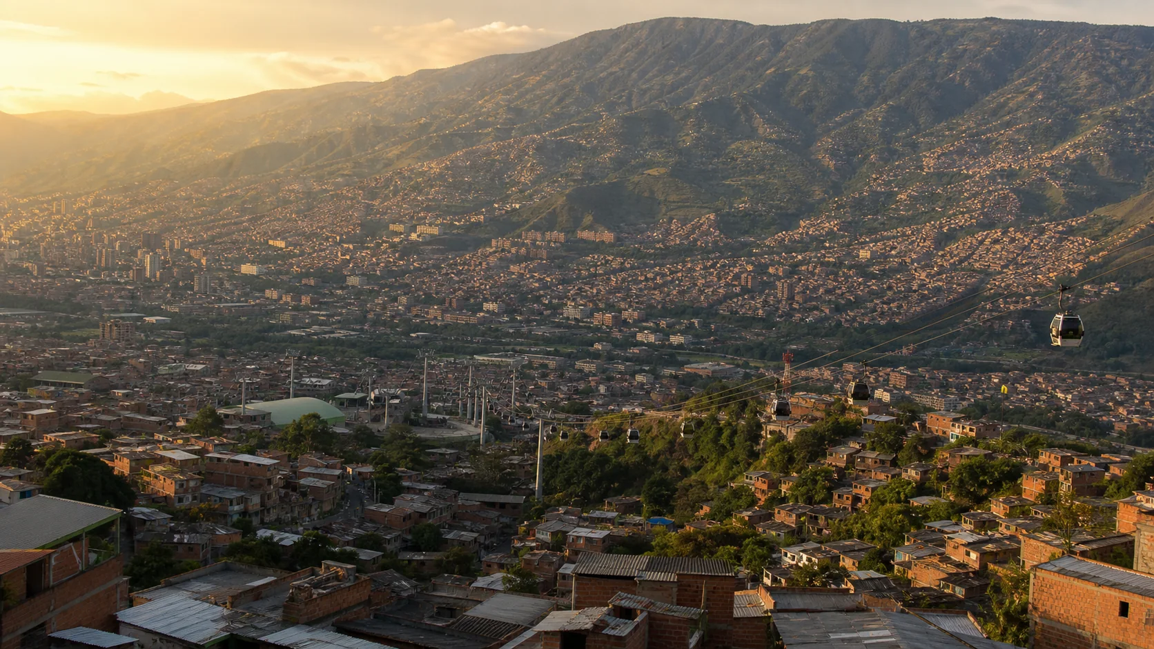 Vista panorámica realista de Medellín al atardecer con el Metrocable y las montañas